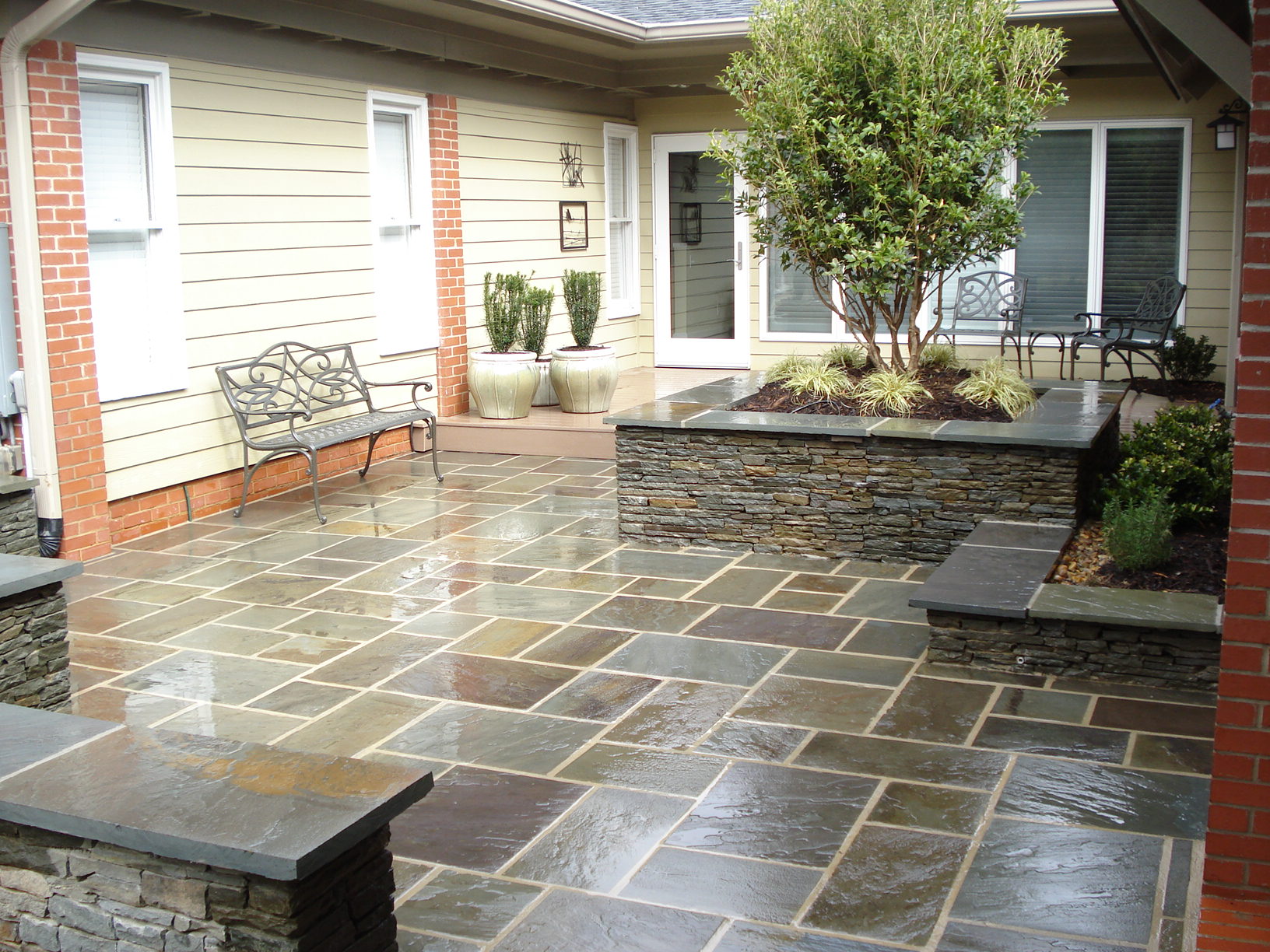 After — Bluestone Patio and Seat Wall | Landscape Solutions